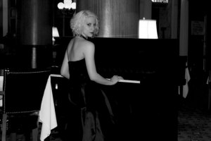 Glamourous Model Recreates Vintage Moments in Time A classy Selina piano shot, one of her first taken as a model